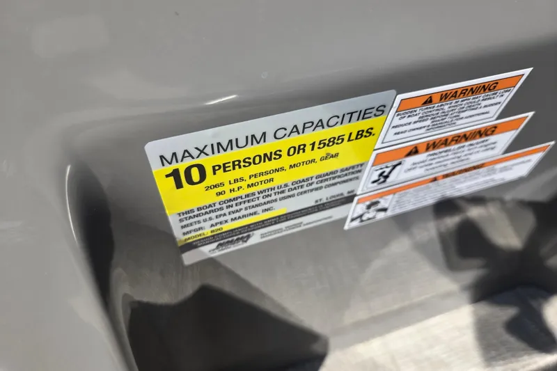 Slide: The Image of Qwest RLS 820 boat capacity label, 2023 model, showing maximum 10 persons or 1585 lbs. - 6