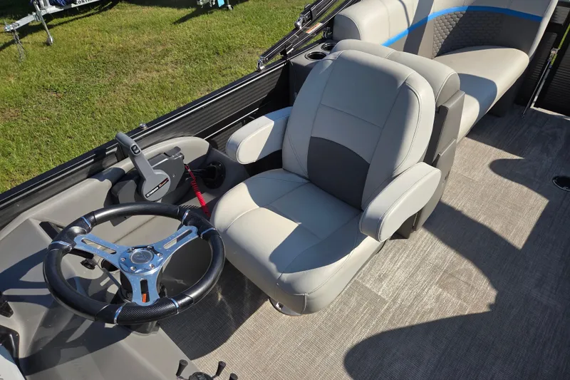Slide: The Image of Captain's seat and steering wheel of 2023 Qwest RLS 820 boat, featuring modern design. - 7