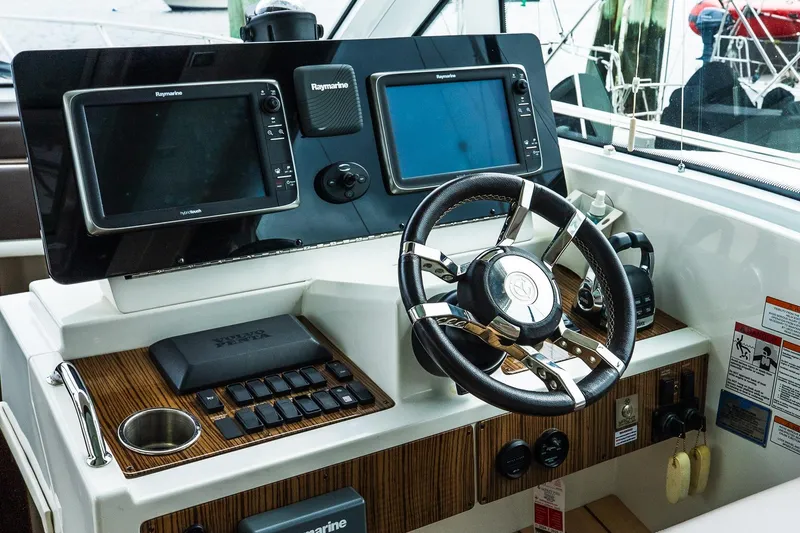 Slide: The Image of Helm of 2013 Cruisers Yachts 48 Cantius with Raymarine navigation displays. - 29