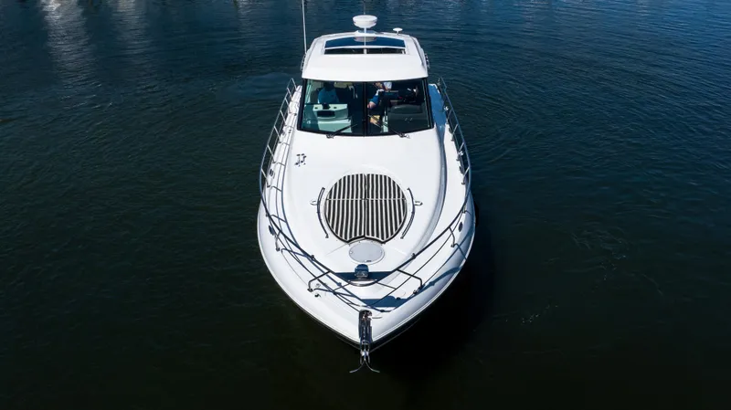 Slide: The Image of 2013 Cruisers Yachts 48 Cantius on calm water, aerial view. - 3