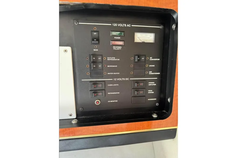 Slide: The Image of Engine compartment of a 2001 Formula 290 Sun Sport boat, featuring dual engines. - 10