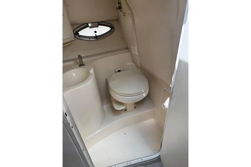 Slide: The Image of Control panel of a 2001 Formula 290 Sun Sport boat, featuring various switches and indicators. - 9