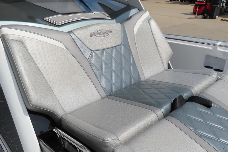 Slide: The Image of 2020 Sunsation 34 CCX boat interior with luxurious silver and gray seating. - 7