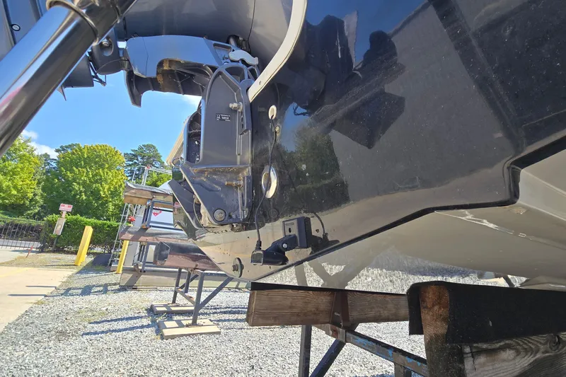 Slide: The Image of 2021 Starcraft SVX 191 OB boat on a stand, showcasing the hull and motor. - 10