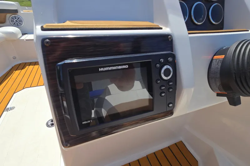 Slide: The Image of Dashboard of 2021 Starcraft SVX 191 OB with Humminbird Helix 5 fish finder. - 34