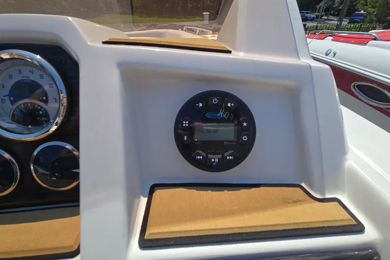 Slide: The Image of 2021 Starcraft SVX 191 OB dashboard with gauges and Jensen audio system. - 35