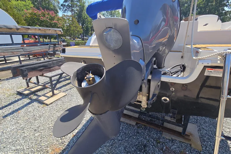 Slide: The Image of 2021 Starcraft SVX 191 OB boat with outboard motor and propeller, displayed outdoors. - 46