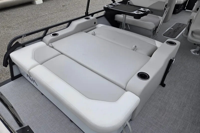 Slide: The Image of 2026 Avalon Platinum LSZ 2385 Entertainer boat with luxurious seating and cup holders. - 10