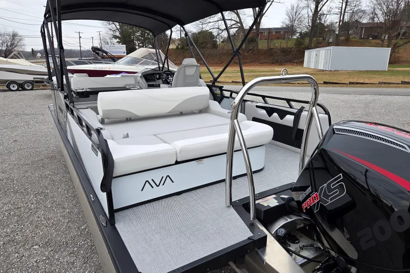 Slide: The Image of 2026 Avalon Platinum LSZ 2385 Entertainer boat with sleek seating and powerful engine. - 11