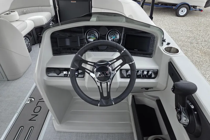 Slide: The Image of Steering console of 2026 Avalon Platinum LSZ 2385 Entertainer boat with modern controls. - 6