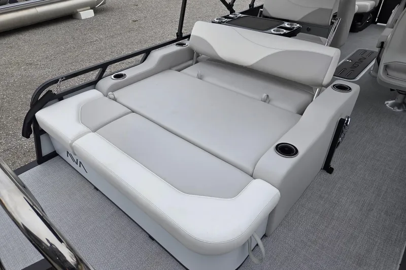 Slide: The Image of 2026 Avalon Platinum LSZ 2385 Entertainer boat interior with luxurious seating and cup holders. - 9