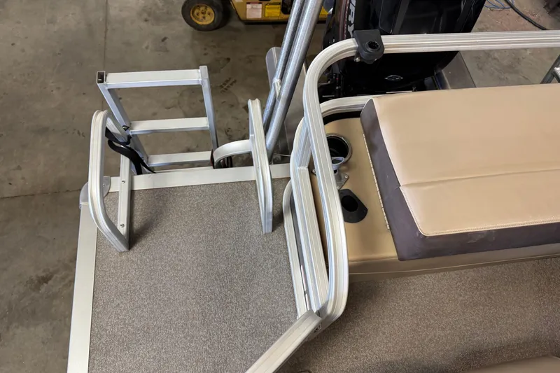 Slide: The Image of 2018 Sun Tracker SportFish 22 XP3 boat interior with seating and ladder. - 18