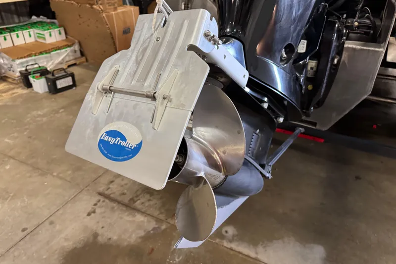 Slide: The Image of 2018 Sun Tracker SportFish 22 XP3 boat propeller with EasyTroller plate in a garage. - 5