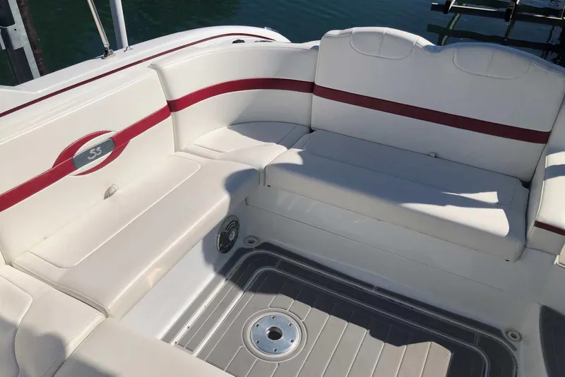 Slide: The Image of 2012 Formula 310 Sun Sport boat interior with white and red seating. - 14