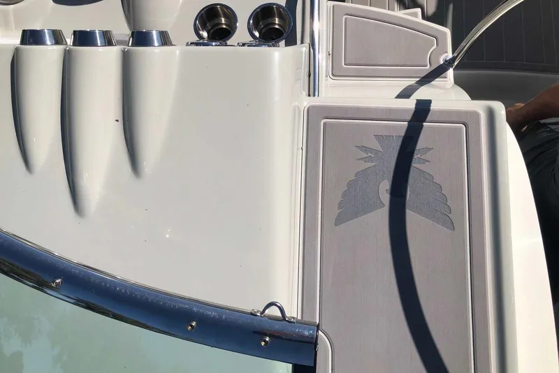 Slide: The Image of Close-up of 2012 Formula 310 Sun Sport boat deck with logo and cup holders. - 23