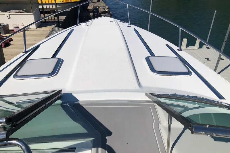 Slide: The Image of 2012 Formula 310 Sun Sport boat deck with sleek design and modern features. - 24