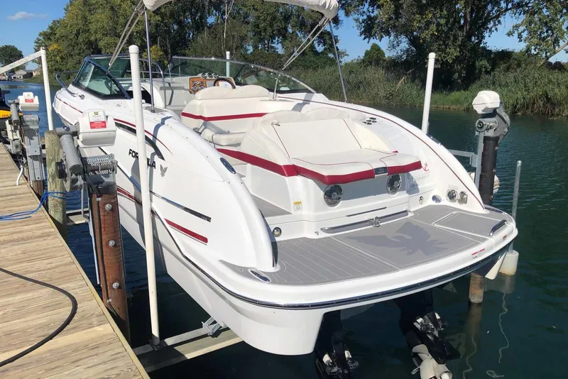 Slide: The Image of 2012 Formula 310 Sun Sport boat docked on a sunny day. - 5