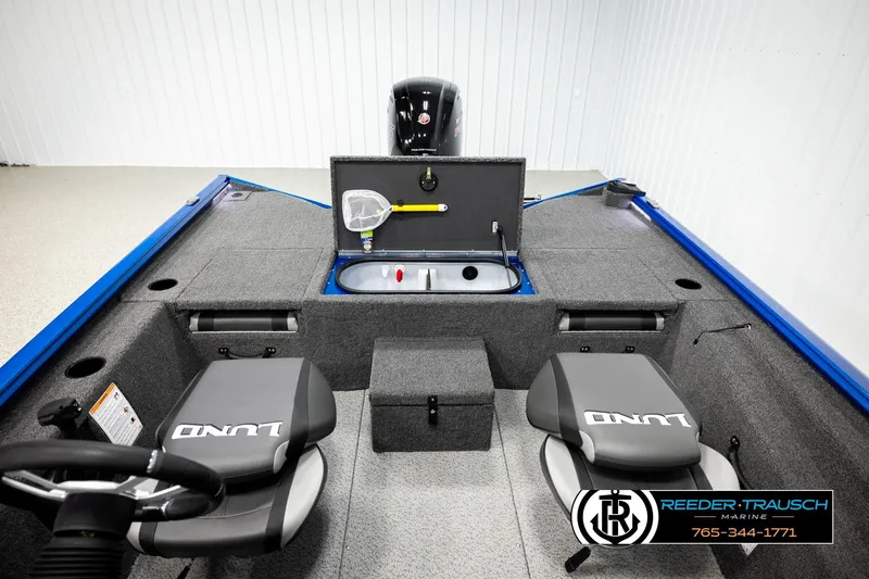 Slide: The Image of 2026 Lund 1875 Renegade boat interior with seating and storage compartments. - 19