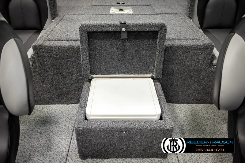 Slide: The Image of Interior of 2026 Lund 1875 Renegade boat with storage compartment open. - 24