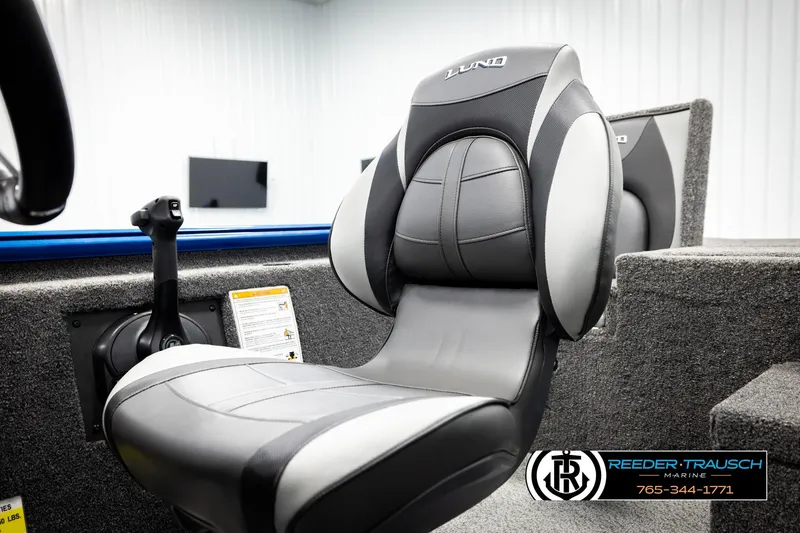 Slide: The Image of 2026 Lund 1875 Renegade boat seat with steering control, showcased by Reeder-Trausch Marine. - 33