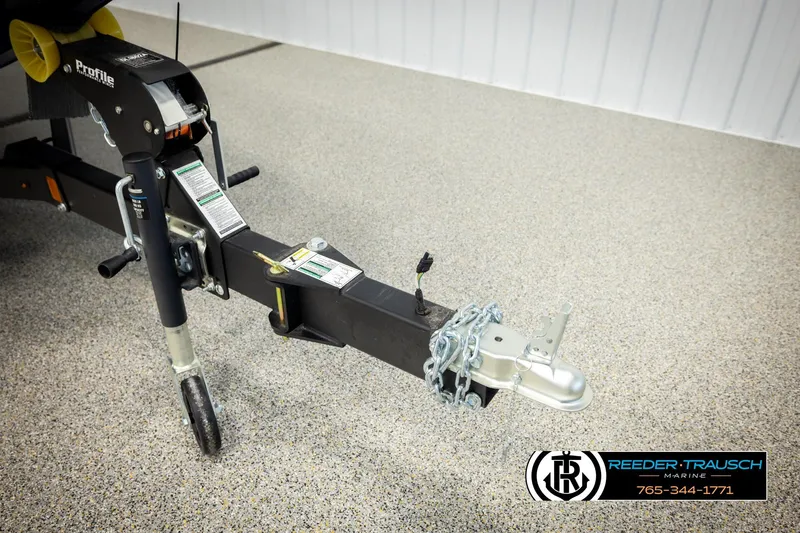 Slide: The Image of Trailer hitch of 2026 Lund 1875 Renegade boat with chain and wheel jack. - 44