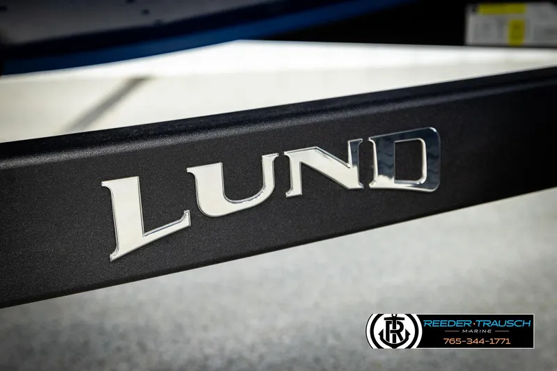 Slide: The Image of 2026 Lund 1875 Renegade boat trailer with Reeder-Trausch Marine branding. - 47