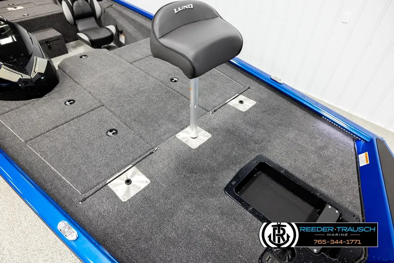 Slide: The Image of 2026 Lund 1875 Renegade boat interior with seating and storage compartments. - 7