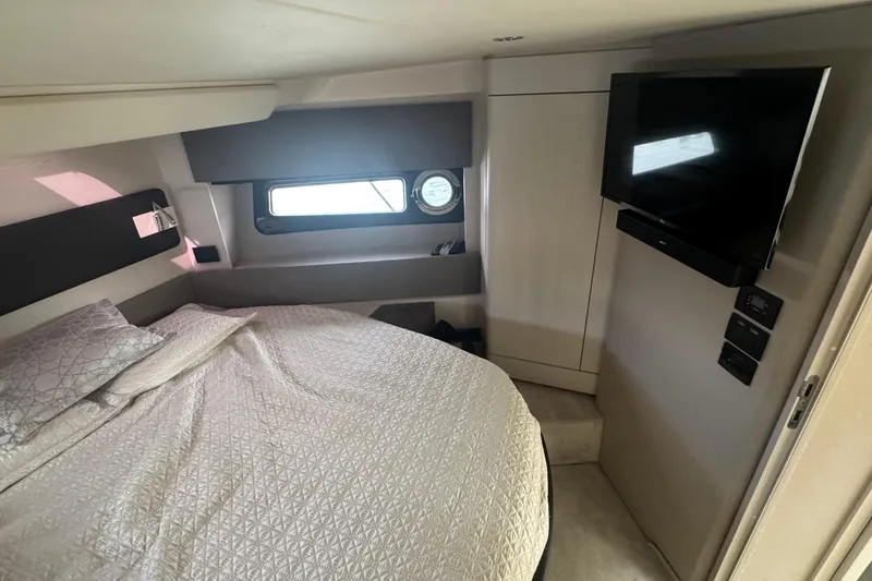 Slide: The Image of Luxurious bedroom interior of 2021 Azimut 50 Flybridge yacht with modern amenities. - 33