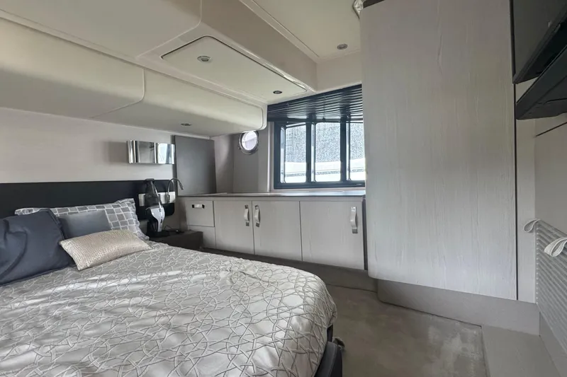 Slide: The Image of Luxurious bedroom interior of 2021 Azimut 50 Flybridge yacht with modern design. - 37