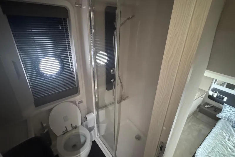 Slide: The Image of Bathroom interior of 2021 Azimut 50 Flybridge yacht with shower and toilet. - 39