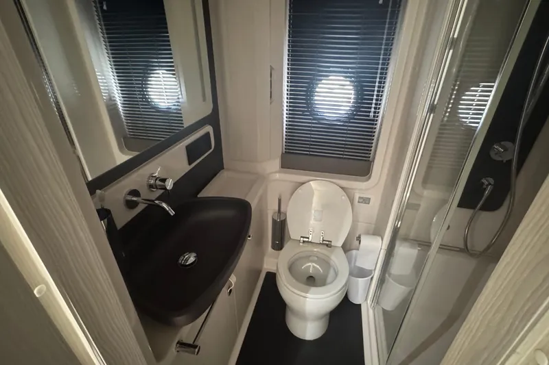 Slide: The Image of Luxurious bathroom in 2021 Azimut 50 Flybridge yacht with modern fixtures and shower. - 40