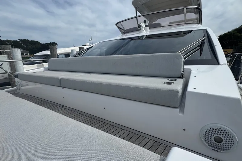 Slide: The Image of 2021 Azimut 50 Flybridge yacht with sleek seating and modern design. - 46