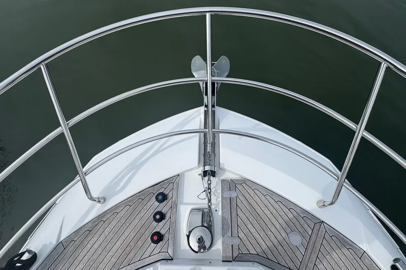 Slide: The Image of Bow view of 2021 Azimut 50 Flybridge yacht with stainless steel railings. - 54