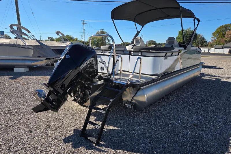 Slide: The Image of 2026 Avalon Platinum LSZ 2385 Quad Lounger pontoon boat with outboard motor and canopy. - 3