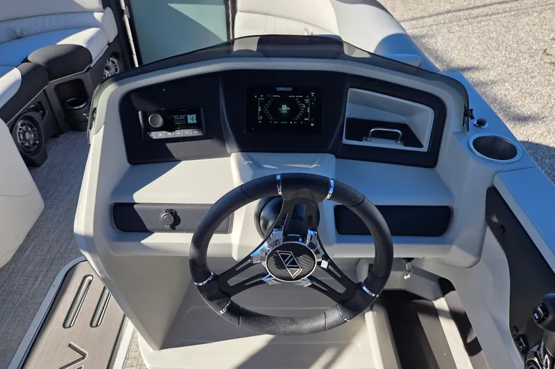 Slide: The Image of Steering console of 2026 Avalon Platinum LSZ 2385 Quad Lounger boat. - 9