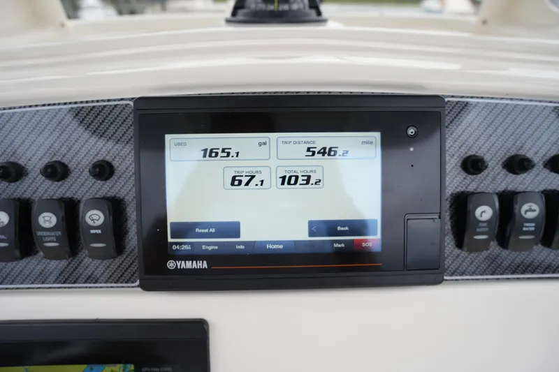 Slide: The Image of Dashboard of 2023 Grady-White 251 Coastal Explorer with Yamaha display showing trip data. - 35