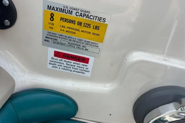 Slide: The Image of 2000 Glastron GX 180 capacity label, warning for 8 persons or 1225 lbs. - 11