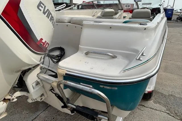 Slide: The Image of 2000 Glastron GX 180 boat with Evinrude outboard motor, rear view. - 5