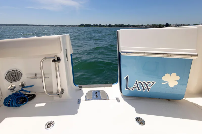 Slide: The Image of Boston Whaler 330 Outrage 2016 boat deck with ocean view and custom graphics. - 24