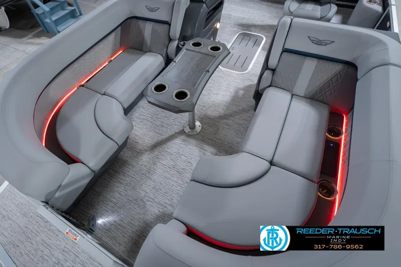 Slide: The Image of Luxurious interior of 2026 Bennington 22 MSB pontoon boat with LED lighting and plush seating. - 10