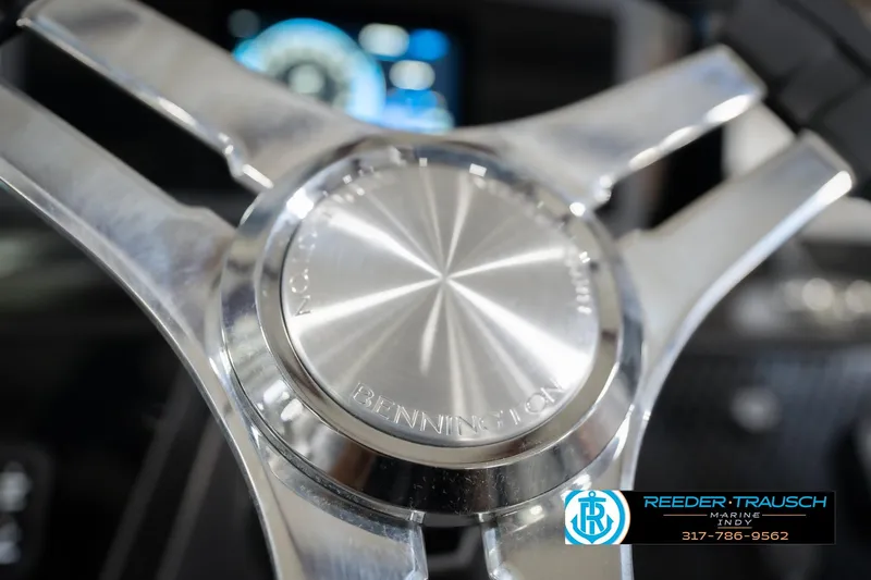 Slide: The Image of Close-up of 2026 Bennington 22 MSB steering wheel with metallic finish. - 36