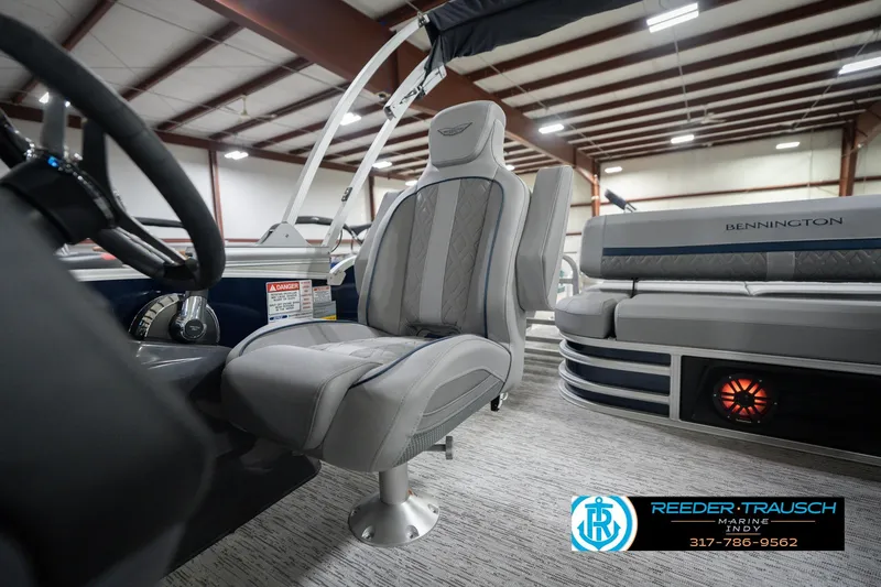 Slide: The Image of 2026 Bennington 22 MSB boat interior with plush seating and modern design. - 41