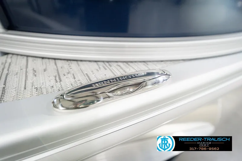 Slide: The Image of 2026 Bennington 22 MSB boat detail with sleek design and branding. - 54