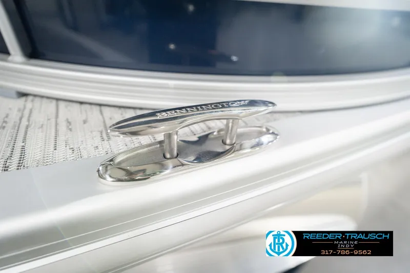 Slide: The Image of 2026 Bennington 22 MSB boat cleat detail with Reeder-Trausch Marine logo. - 55