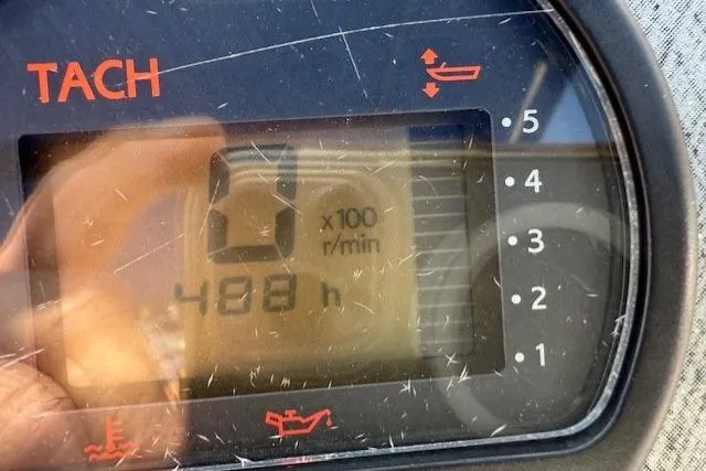 Slide: The Image of Tachometer of 2004 Glastron 213 WA showing 488 hours and RPM gauge. - 7