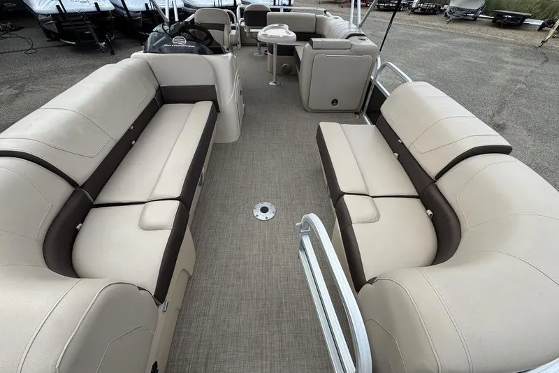 Slide: The Image of 2018 Sun Tracker SportFish 22 XP3 pontoon boat with spacious seating and modern design. - 28