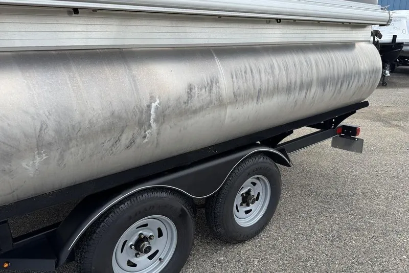 Slide: The Image of 2018 Sun Tracker SportFish 22 XP3 pontoon on a trailer, side view. - 29