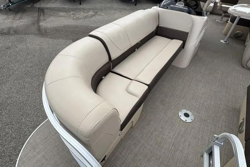Slide: The Image of 2018 Sun Tracker SportFish 22 XP3 pontoon boat with beige seating and spacious deck. - 34