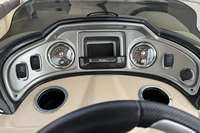 Slide: The Image of Dashboard of 2018 Sun Tracker SportFish 22 XP3 boat with gauges and controls. - 38