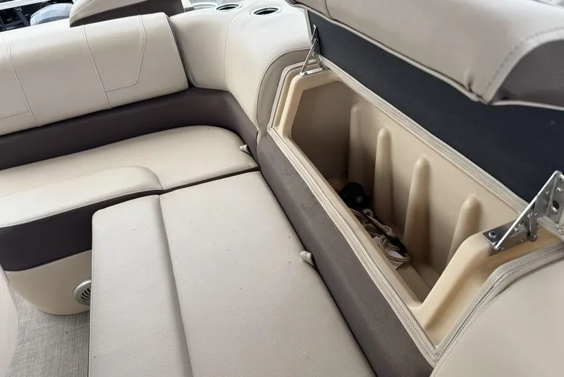 Slide: The Image of 2018 Sun Tracker SportFish 22 XP3 boat seat with open storage compartment. - 44